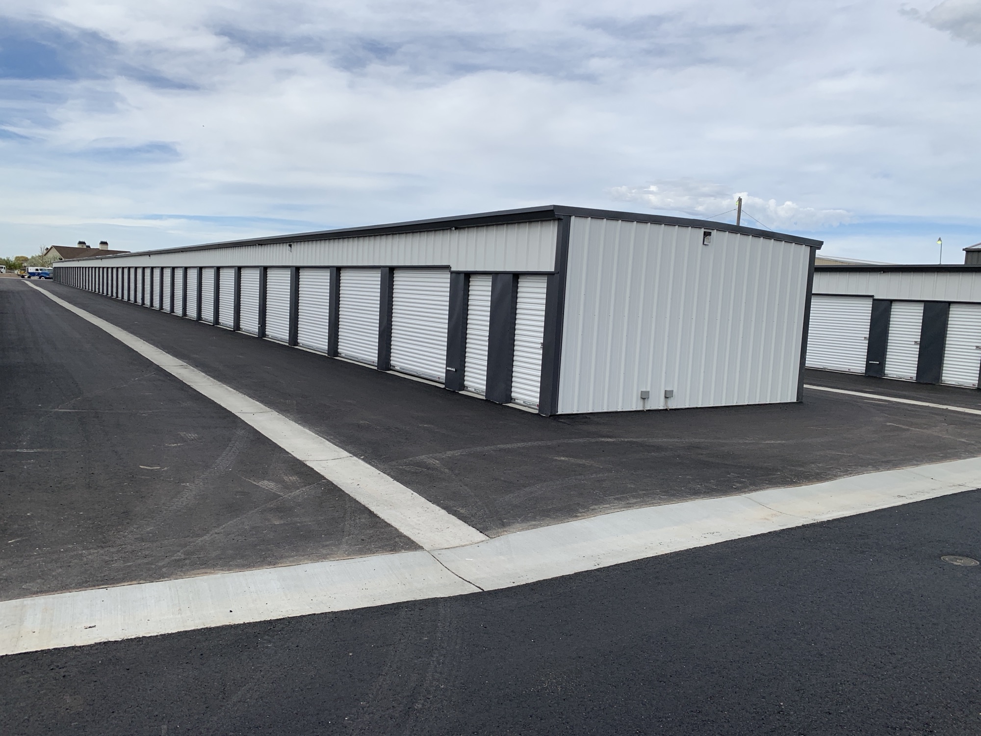 The yard from the ground — asphalt aisles and concrete aprons