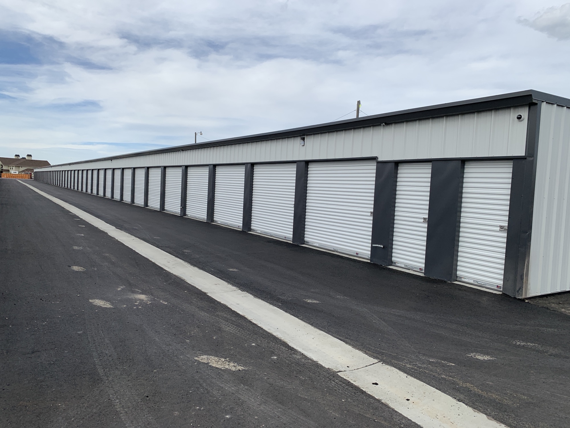 Roll-up doors at ground level on every unit